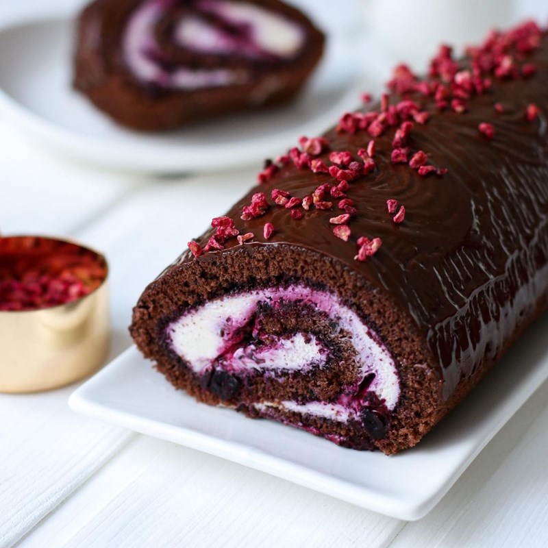 Peerless chocolate swiss roll with berry confit