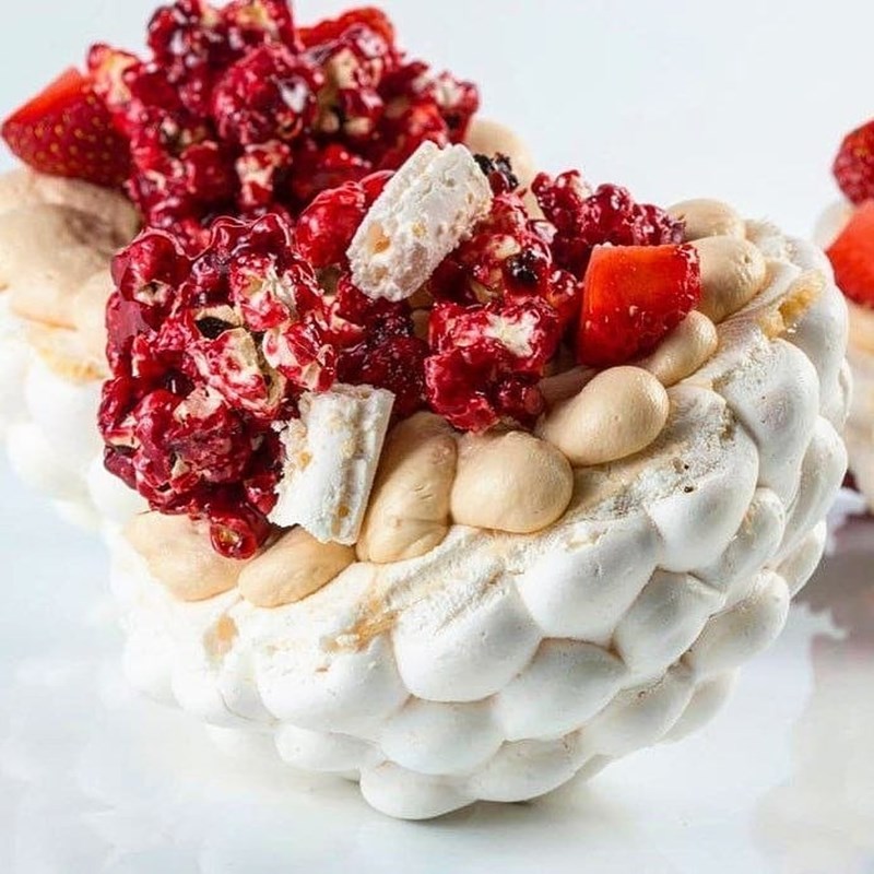 Pavlova meringue dessert with passion fruit