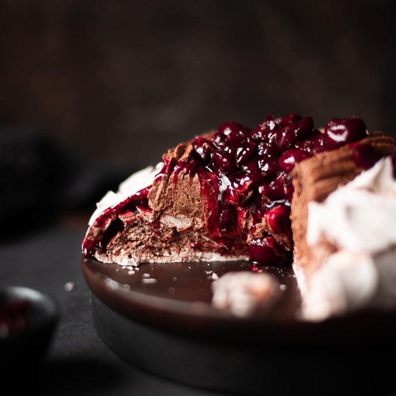 Pavlova with chocolate mousse & cherry topping