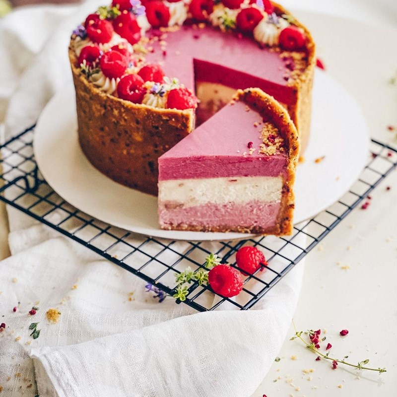 Three-layer raspberry & peanut cheesecake