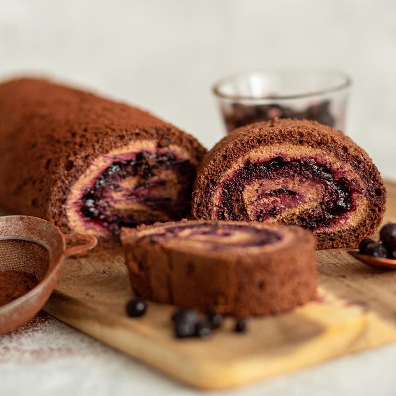 Chocolate sponge roll with blueberry jam