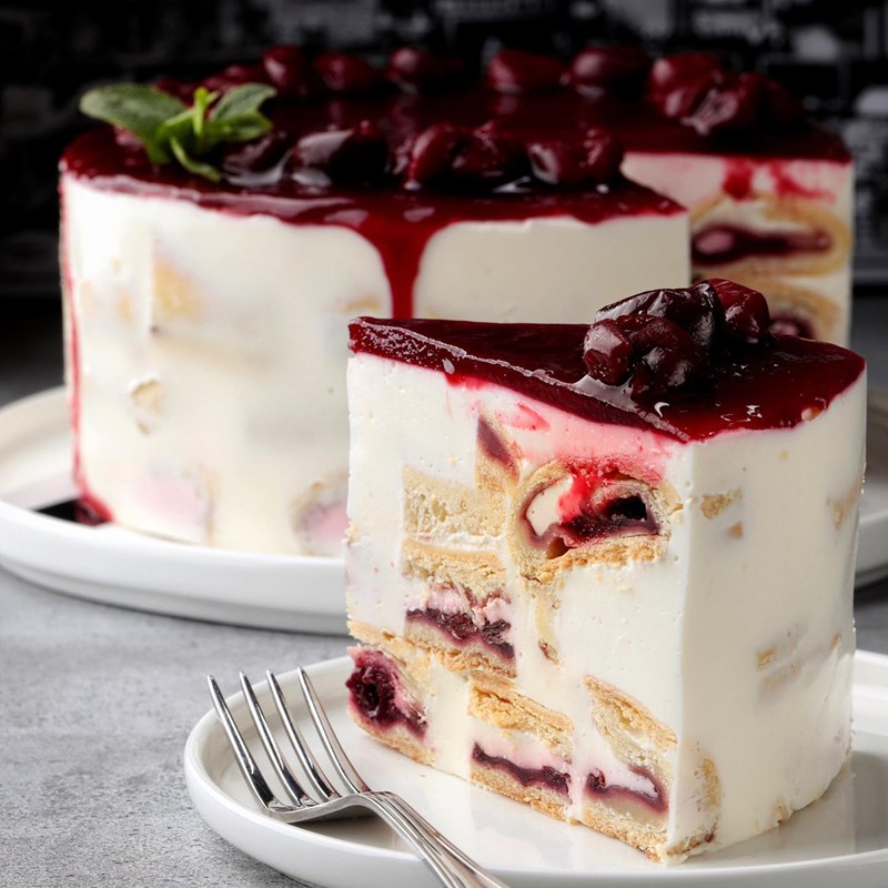 Sour cream soufflé cake with cherries